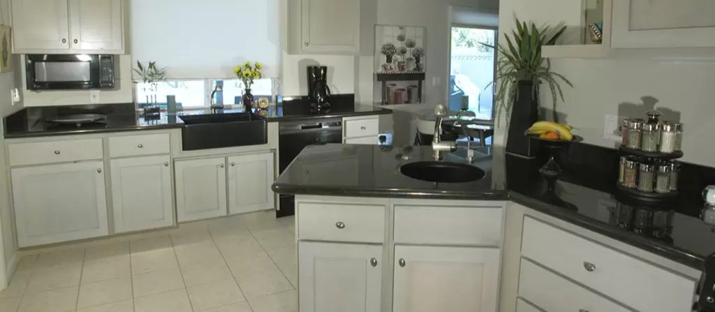 Homeowners Appreciate Refinishing Before the Holidays black granite countertop